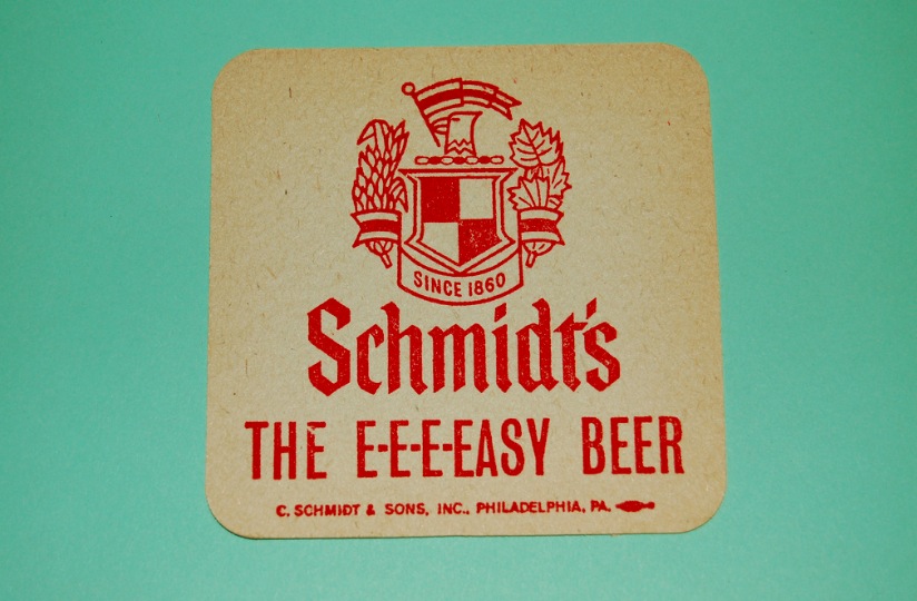 An image of a Schmidts beer coaster