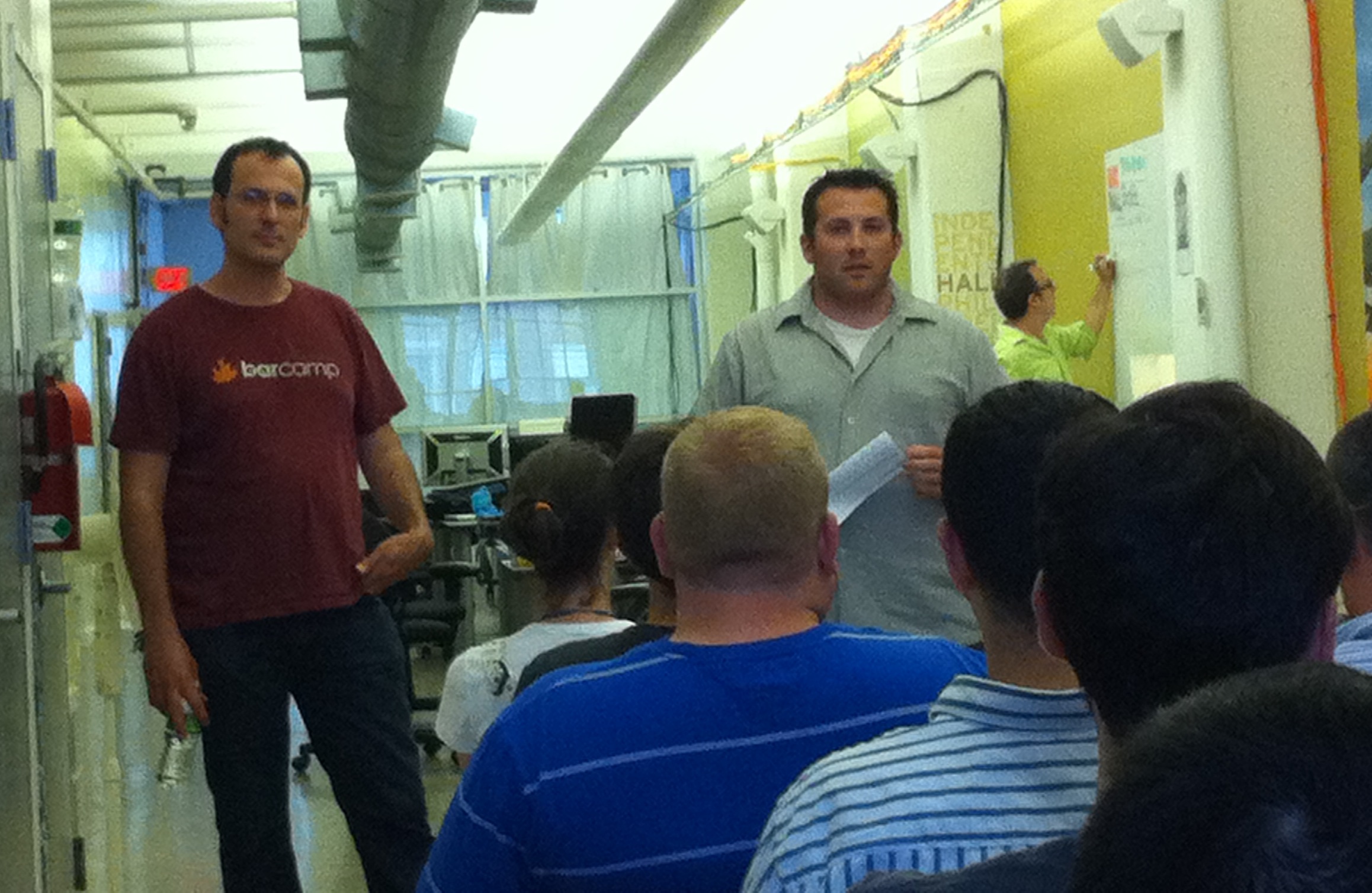 Indenpendents Hall co-founders Geoff DiMasi (left) and Alex Hillman speak at the coworking space's Town Hall.
