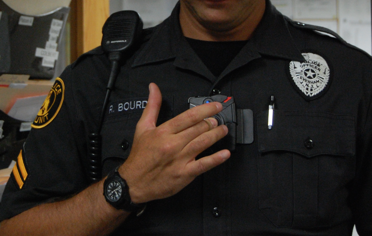 A New Jersey police officer tests out a body camera in 2014.