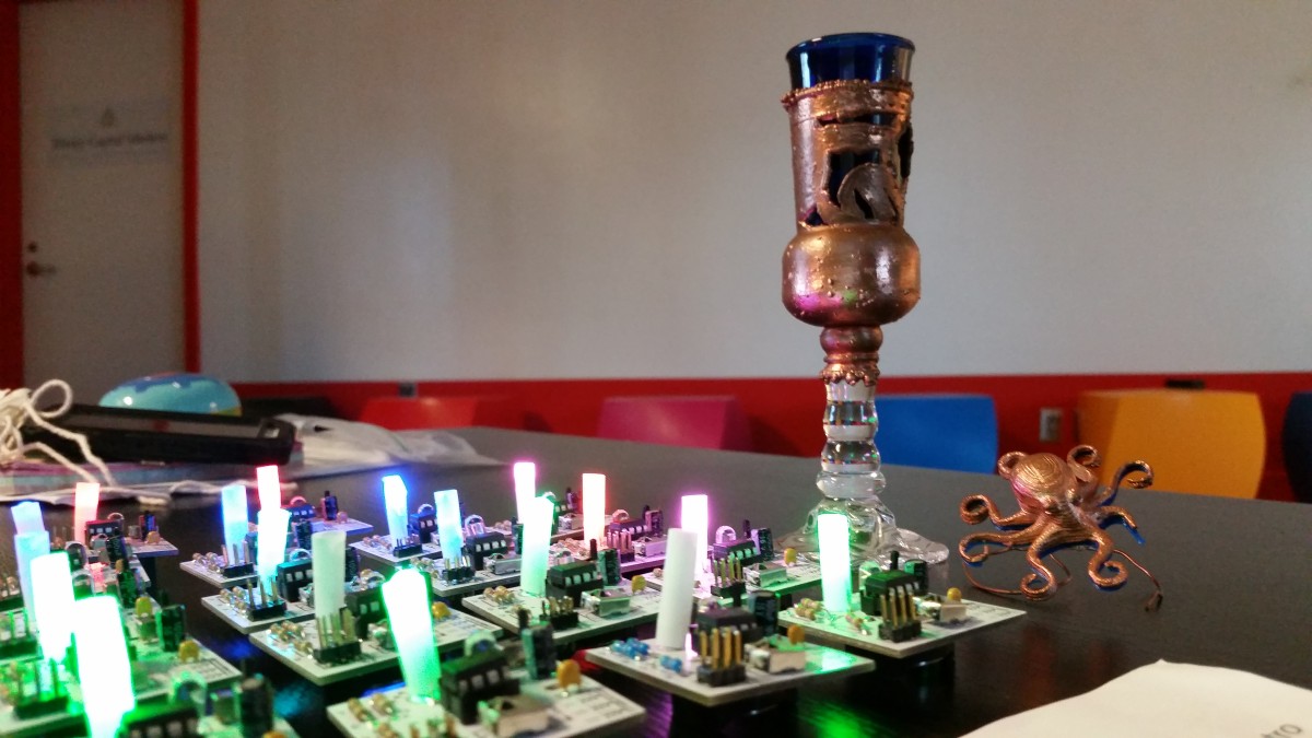 Motion-sensor LED gadgets and an electroformed copper chalice are just two pieces of Barrel of Makers handiwork.