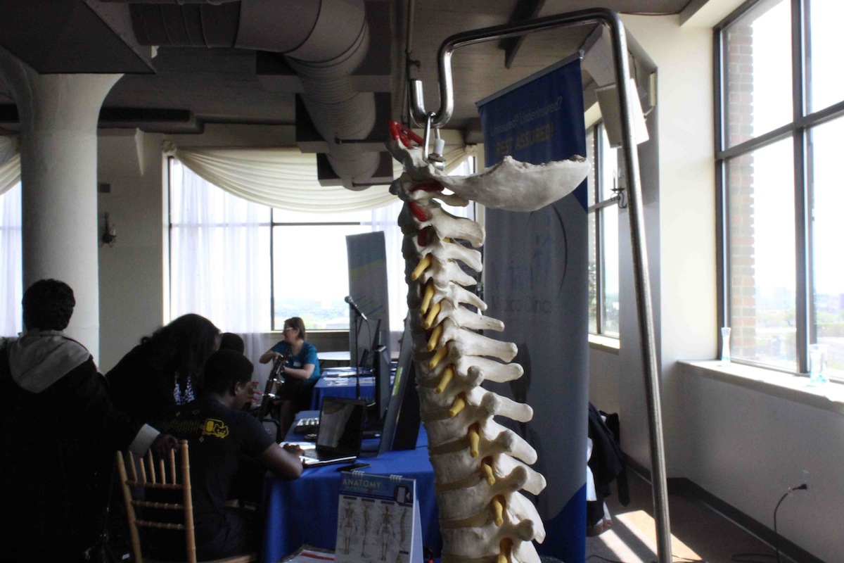 At the Pyramid STEM Showcase, Miriam Medical Clinics displays the model of a spine.