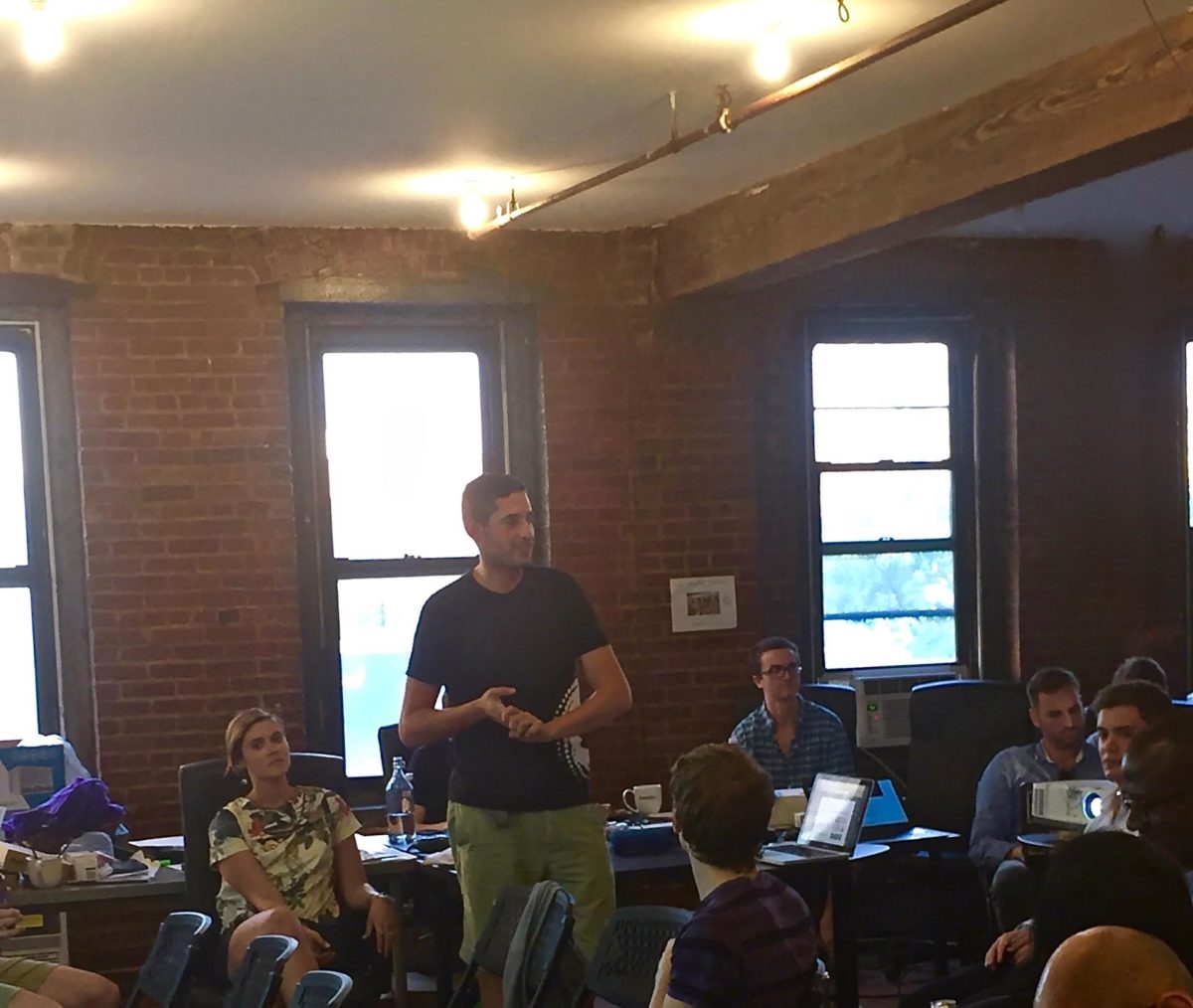 Ryan Gittleson talks about Virtue Poker, a blockchain-based online poker application, at the ConsenSys open house.