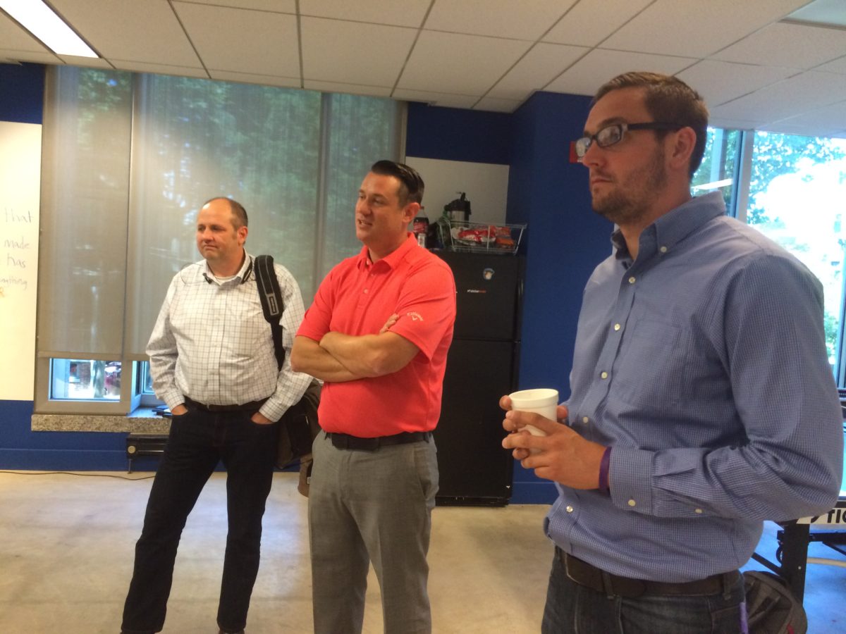 Left to right: Stewart Belsham of Symbiosys, Bob Downing of Delaware Sports League and Nat Measley of The Fun Department pitch ideas to camp students.