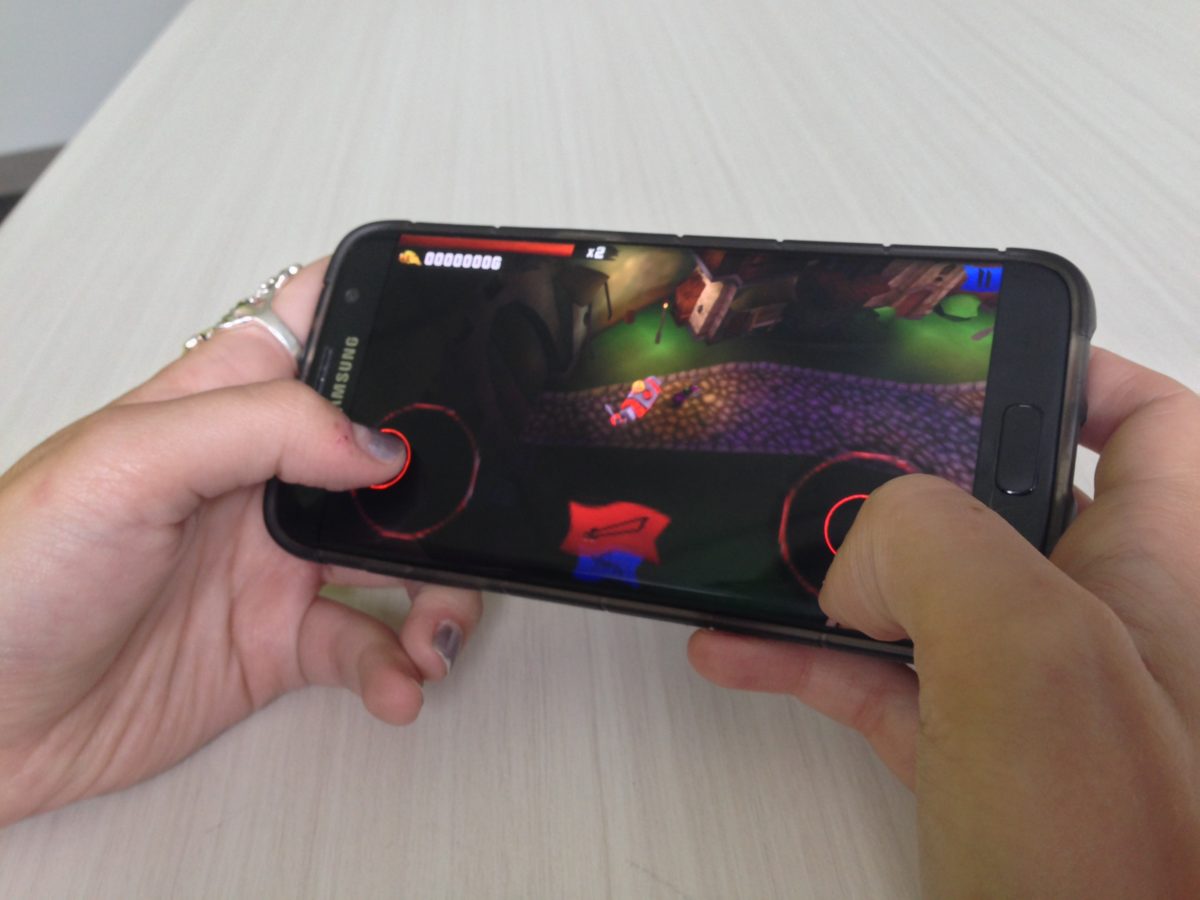 Technically Media intern Rachel Zydyk giving Knight Strike a try.