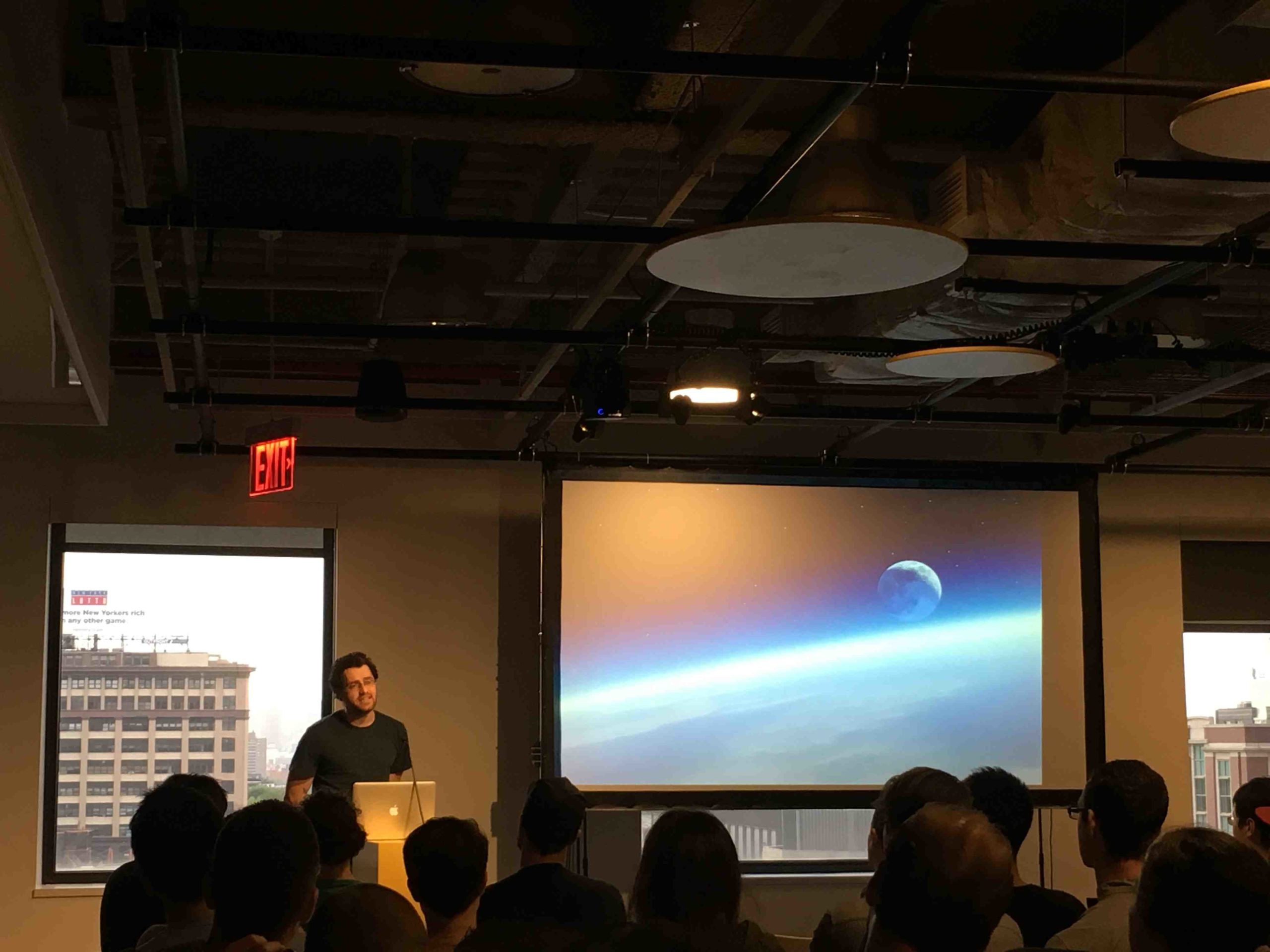 Austin Wintory speaks in the NYU Tandon School of Engineering building.