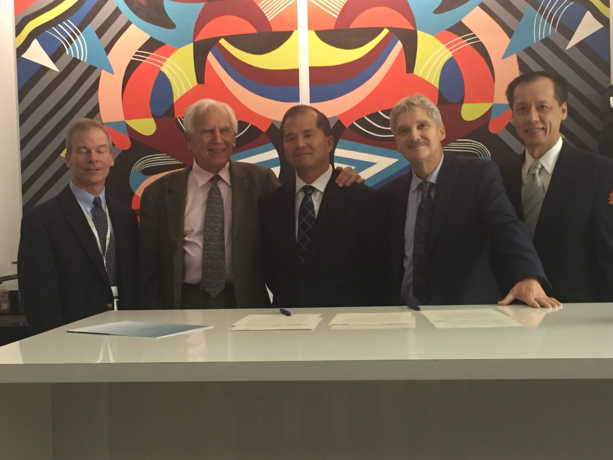 Immunomic Therapeutics and JHU reps celebrate their licensing deal in November 2015.