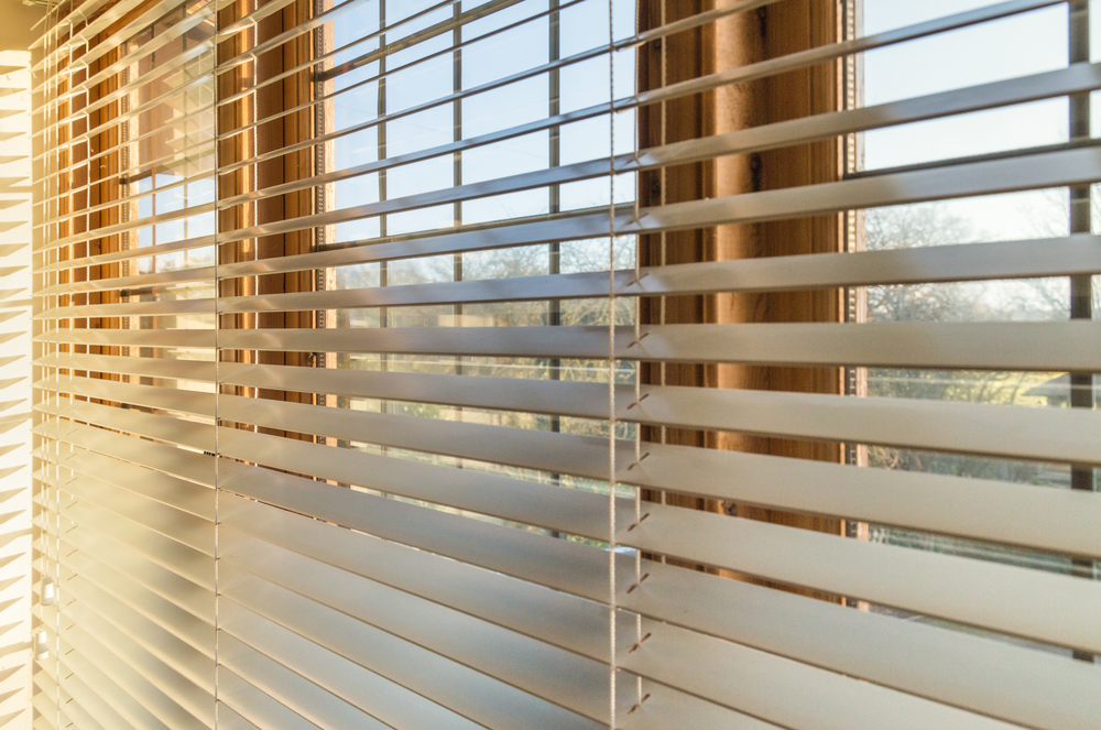 (Blinds Home Catching the Sunlight by CBCK via Shutterstock)