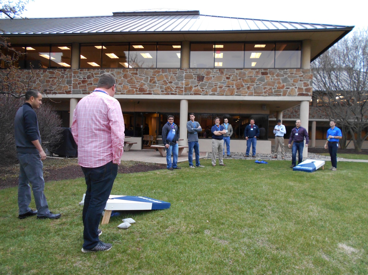 Playing cornhole at Deacom.