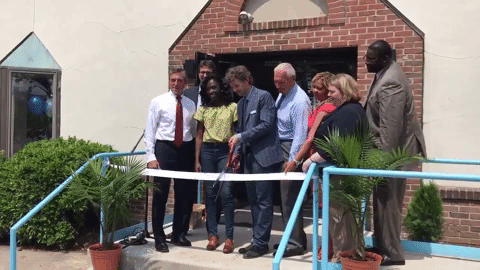 NextFab CEO Evan Malone cutting the ribbon at NextFab's new location.