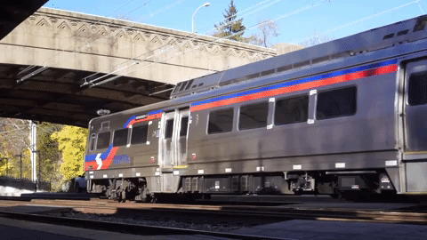 A SEPTA train chugs away from Overbrook Station.