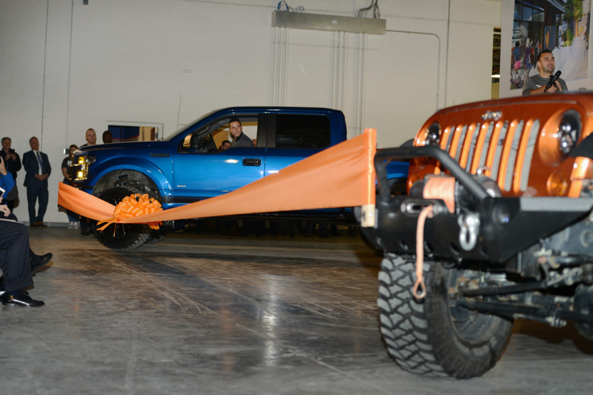The ribbon at the company's new HQ was torn apart by a Wrangler and a F-150.