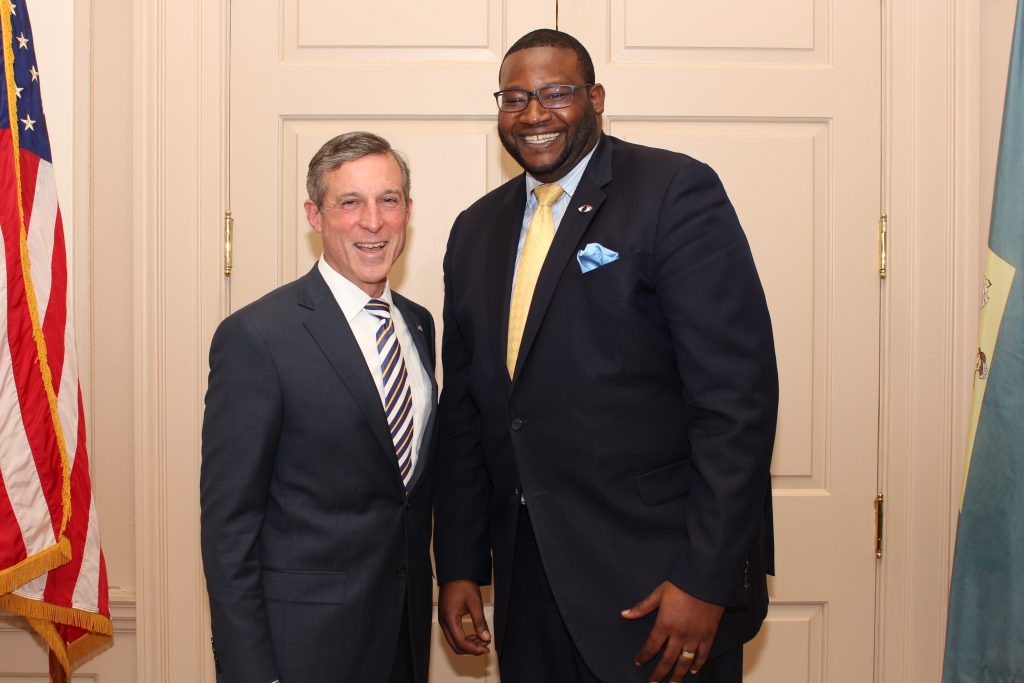 Cerron Cade with Gov. John Carney in January.
