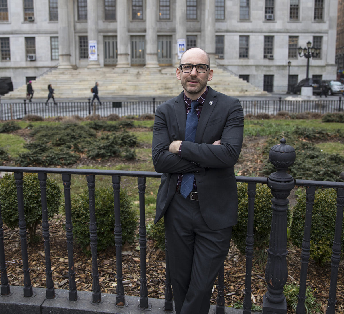 Andrew Hoan, CEO of the Brooklyn Chamber of Commerce, stands in front of Borough Hall, March 28, 2017.