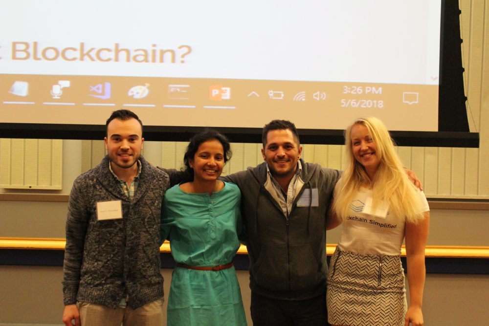 Aashaka Desai, second from left, developed a winning blockchain project that prevents evidence tampering.
