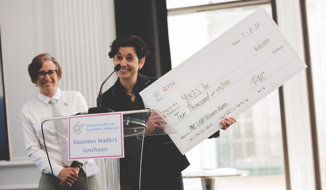 Tracey and Mia Levesque, founders of Yikes, Inc., accepting the big check.
