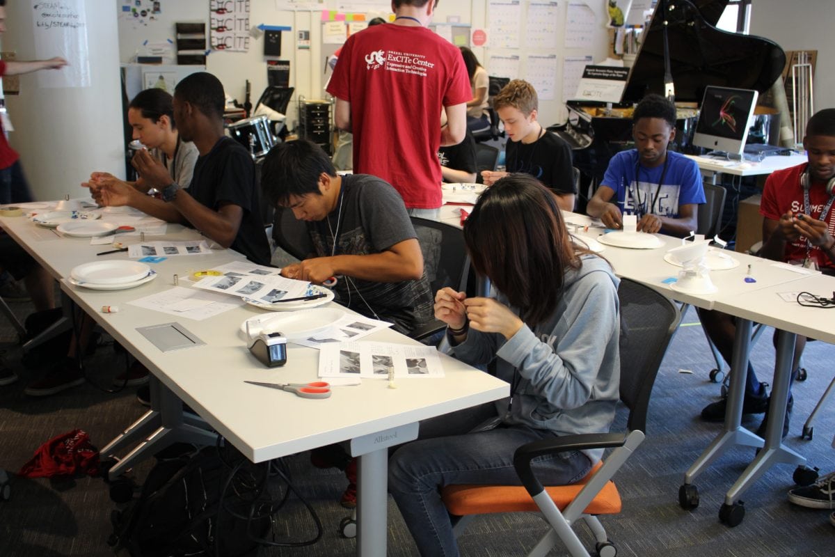 Kids making things inside the ExCITe Center.