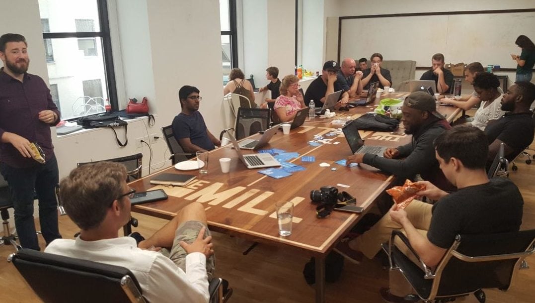 A group of people around a table.