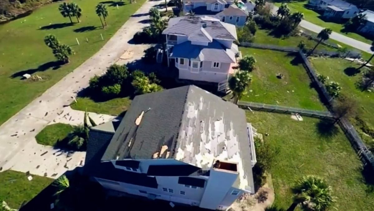 An aerial shot of damaged homes.