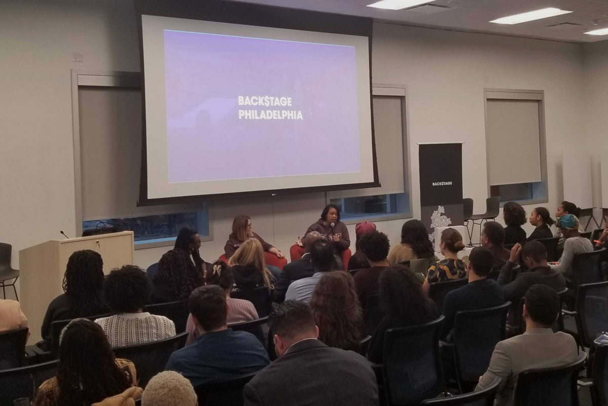 Arlan Hamilton speaks in front of an audience