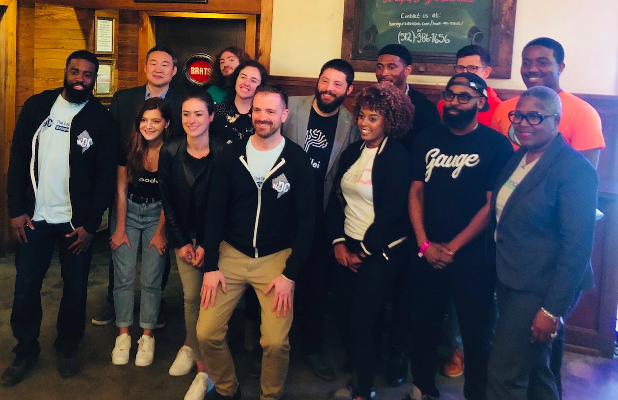 Founders standing together smiling