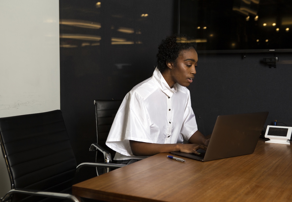A person uses a laptop