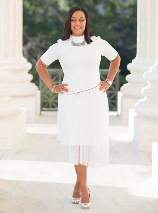 LaKisha Greenwade standing next to pillars