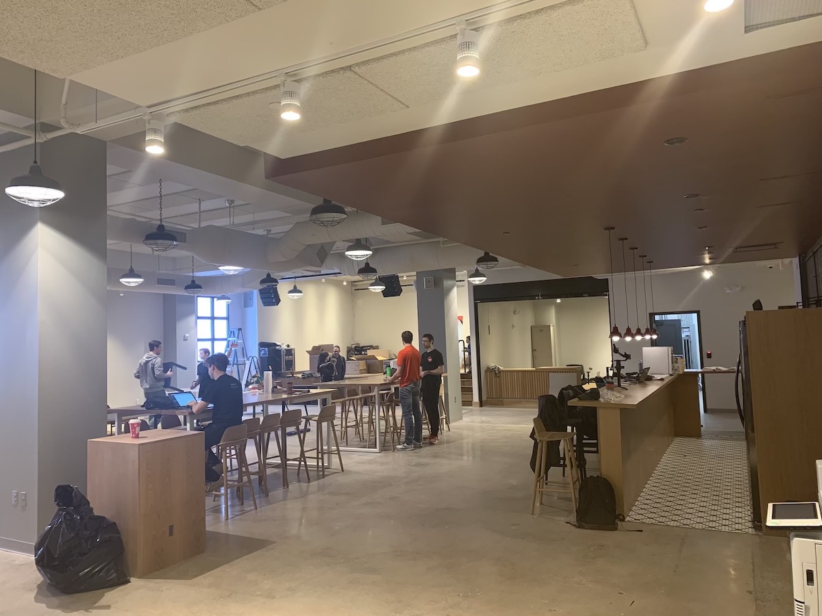 The main communal coworking and event space inside REC Philly’s Fashion District hub in 2019.