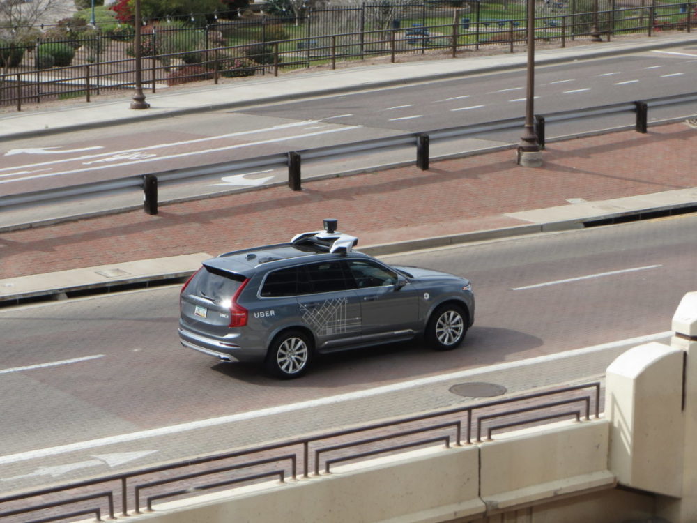 A van with autonomous vehicle technology on the roof