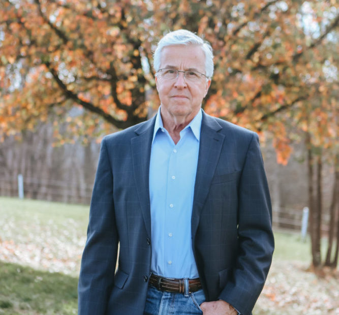 A headshot of QCI CEO Robert Liscouski.