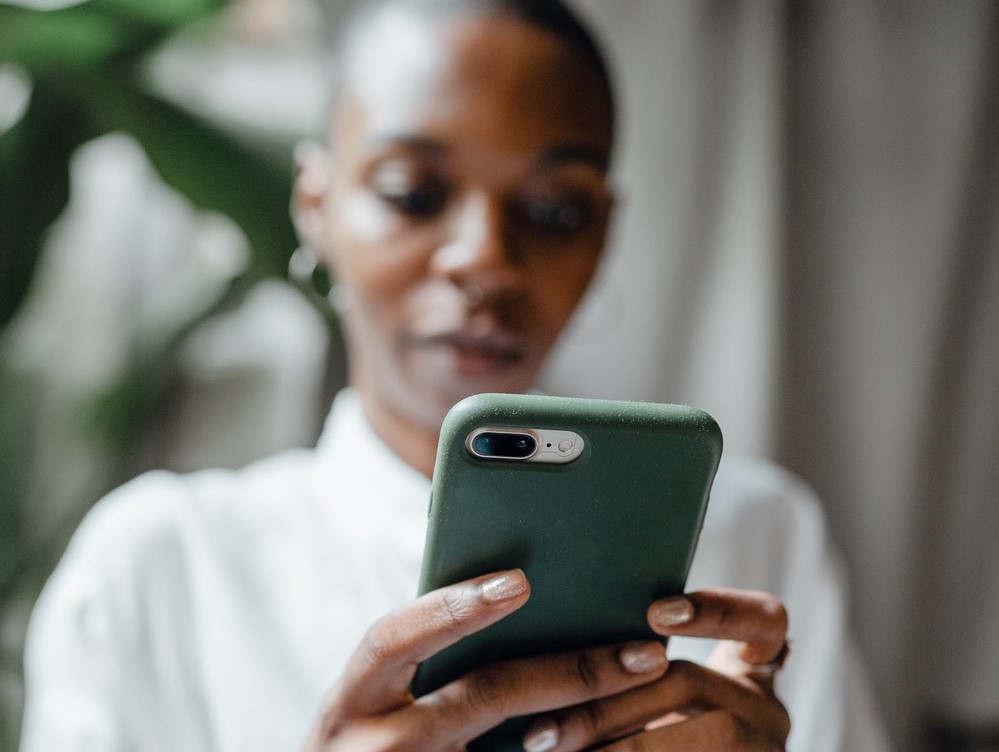 Woman looking at a smartphone