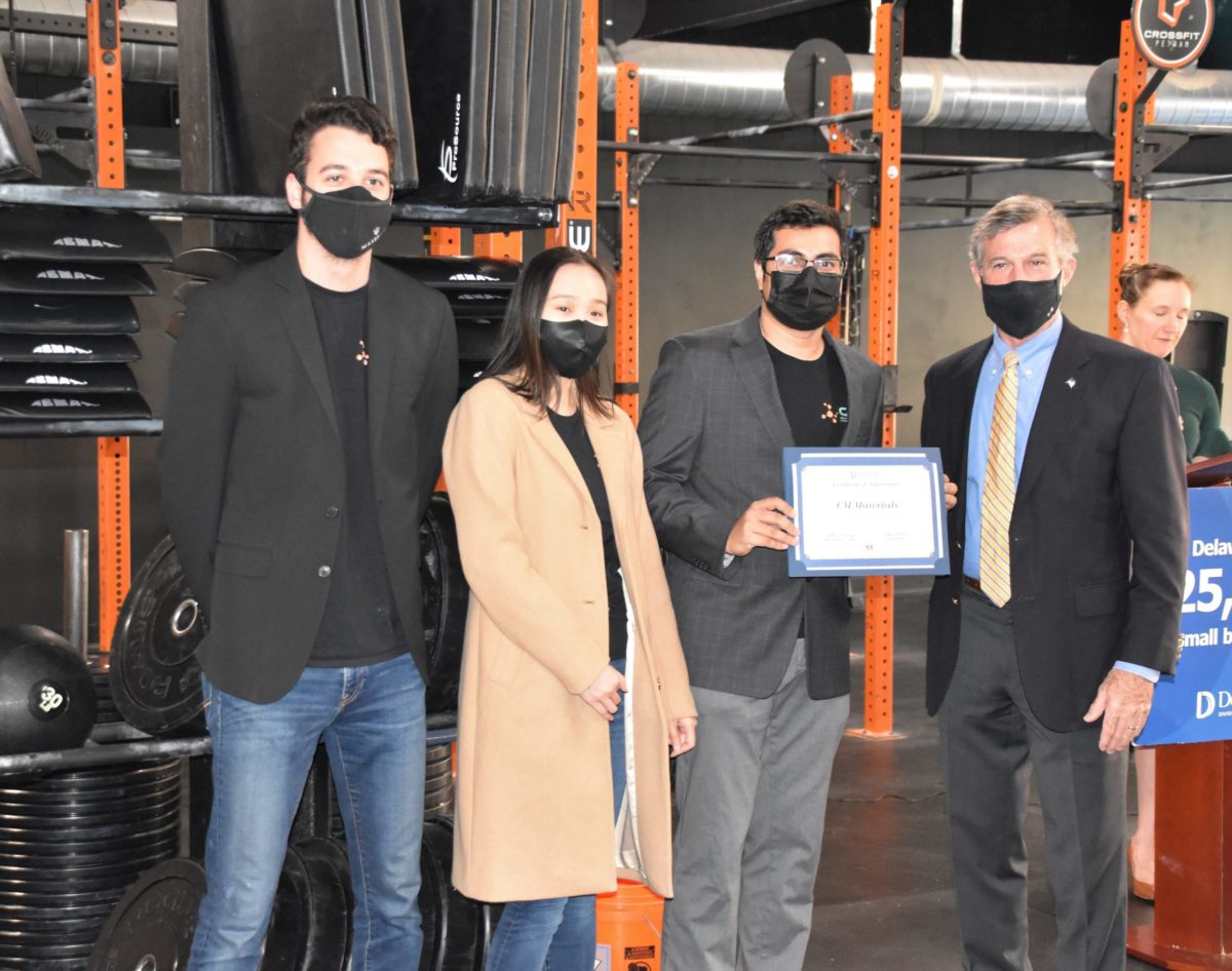 The CM Materials team receiving the EDGE grant from Gov. Carney