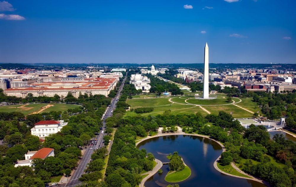DC cityscape below blue sky