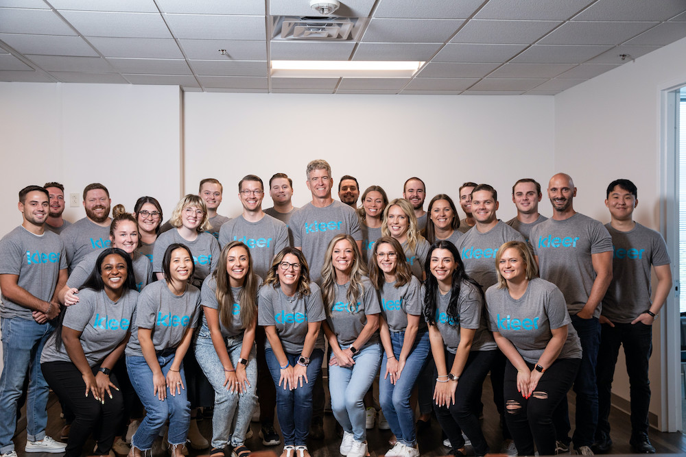 The team at Kleer posing together.