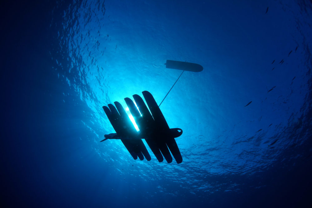 An underwater view of the Wave Glider.