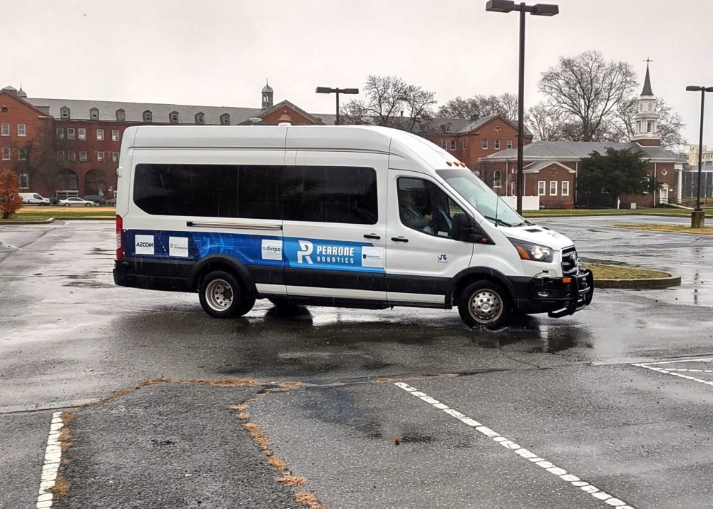 shuttle bus parked in a parking lot