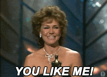 Animated gif of Sally Field accepting her Oscar saying "You like me"