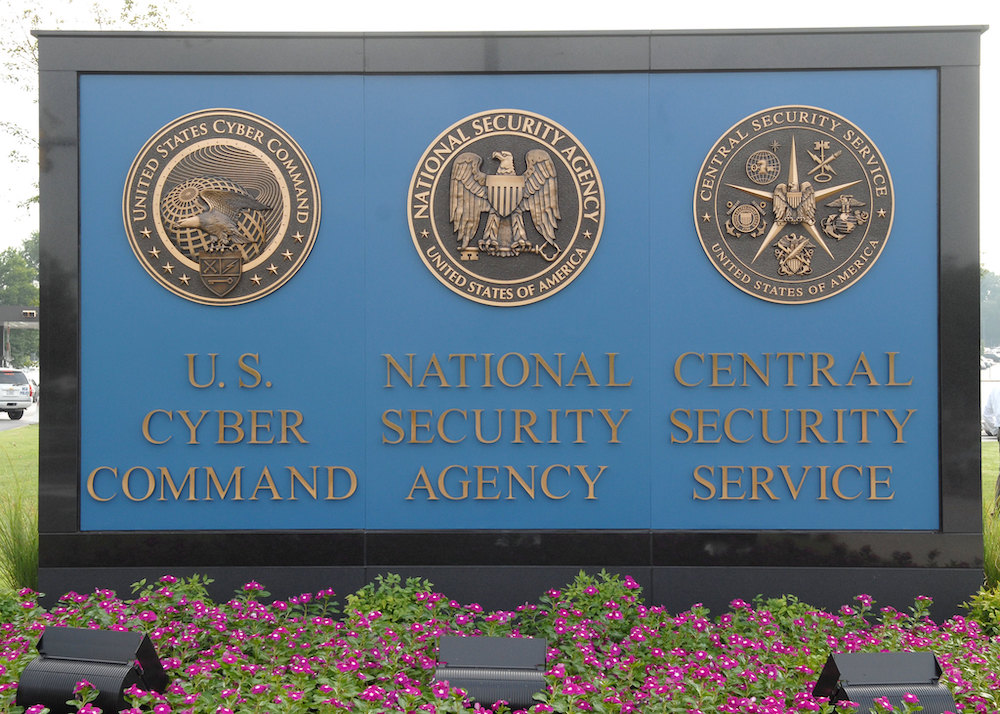 Gold federal seals with descriptive text on blue background near pink and green flowers