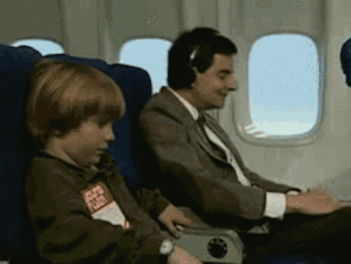 Animated gif of Mr. Bean on a plane.