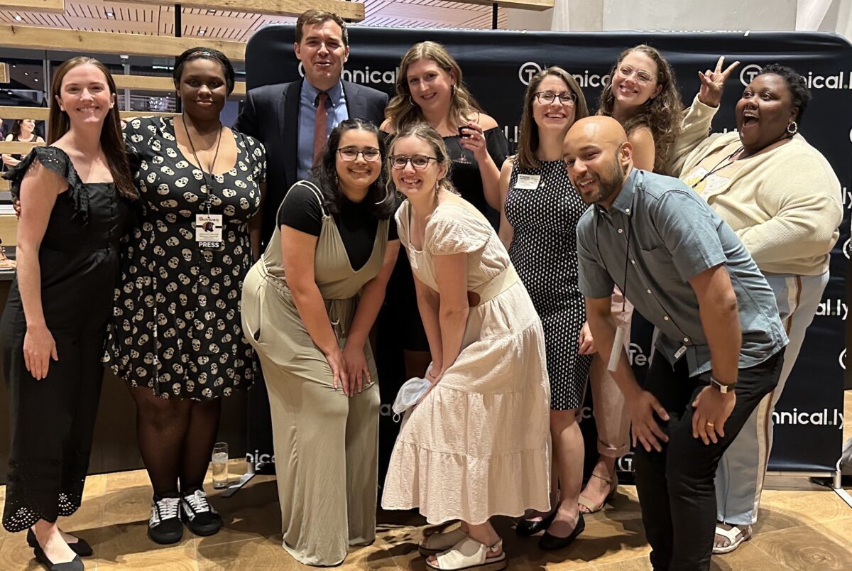 A group of people posing for a picture.