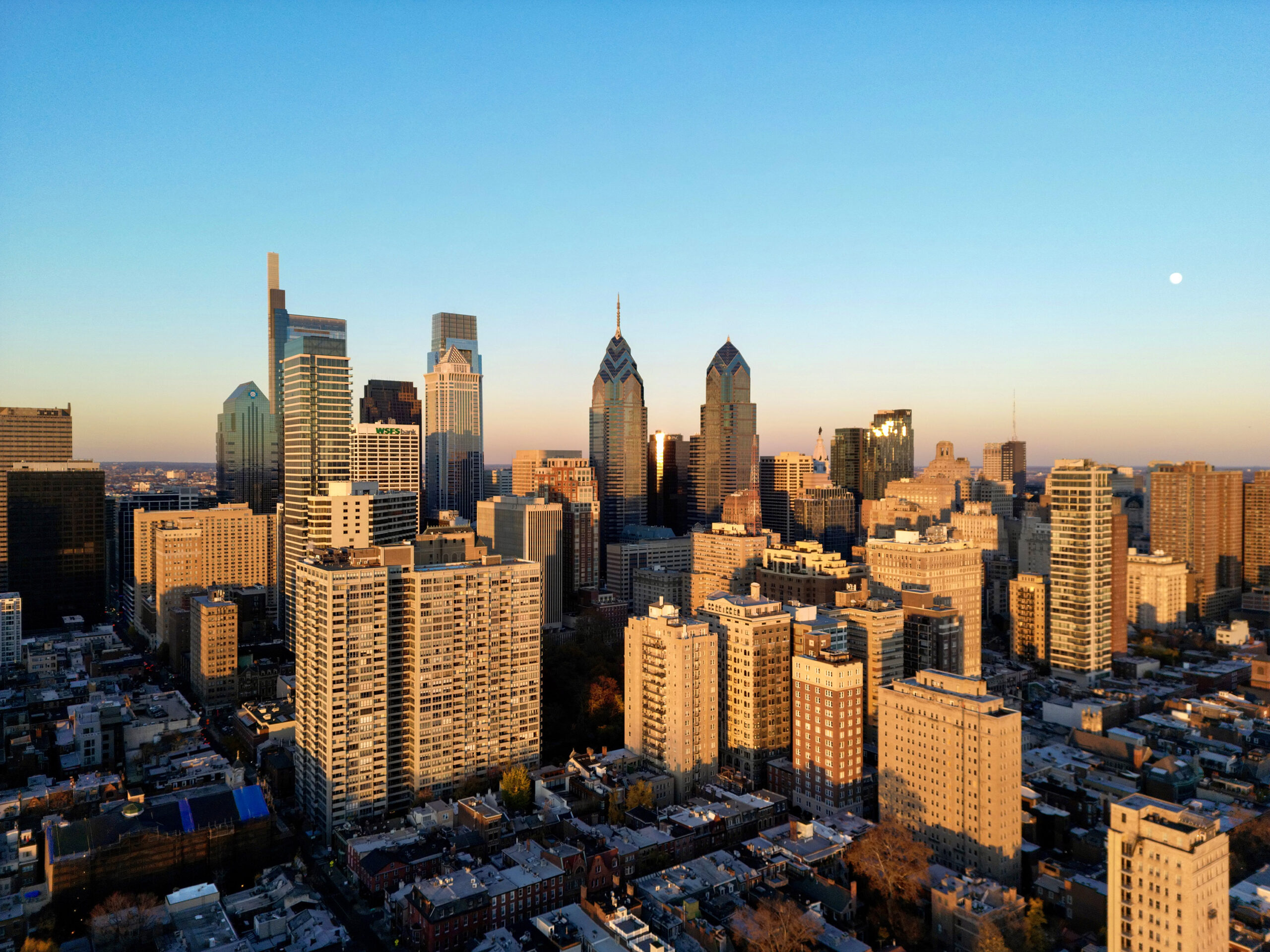 An aerial view of the city of Philadelphia at sunset.
