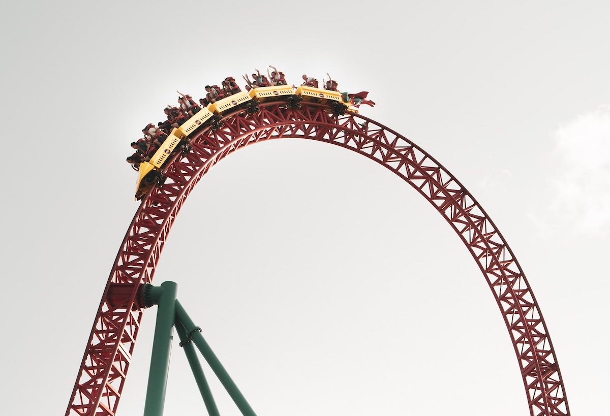 A roller coaster ride on a cloudy day.