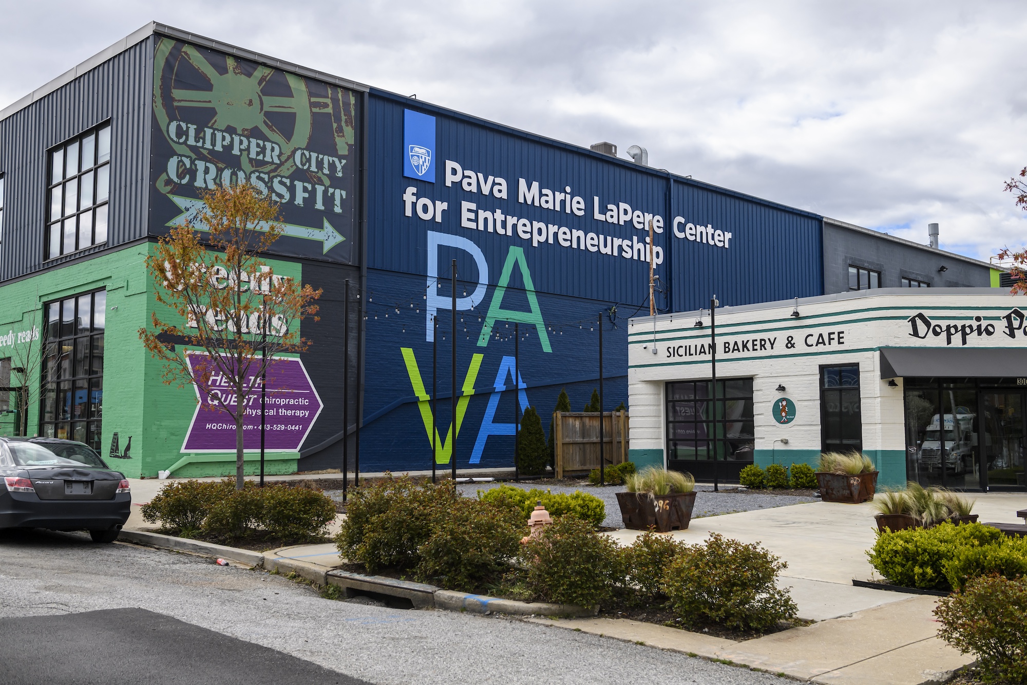 The Pava Center in Remington with navy wall and multicolored text.