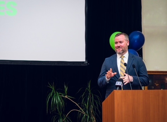 A man standing at a podium