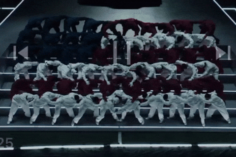 Animated gif of Kendrick Lamar's Super Bowl Halftime performance with dancers in the shape of the American flag.