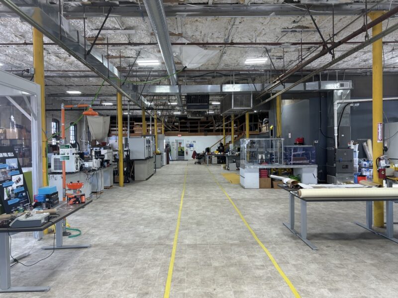 A large room with manufacturing equipment