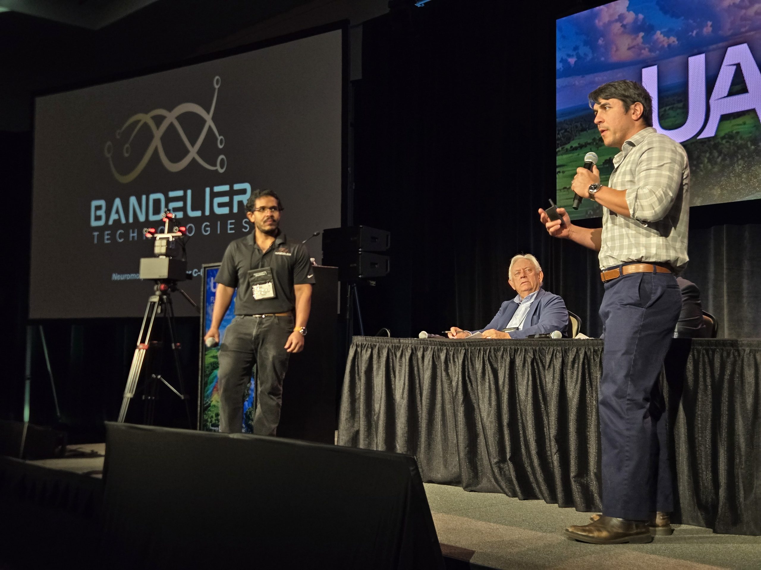 Representatives from Bandelier Technologies speak on stage at the 2026 UAS Summit & Expo.